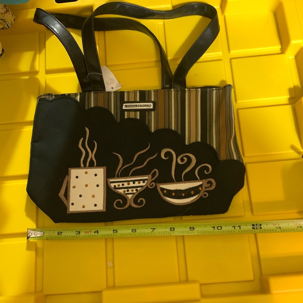 **NWT** vintage Longaberger bag tag is worn so not readable but it’s new